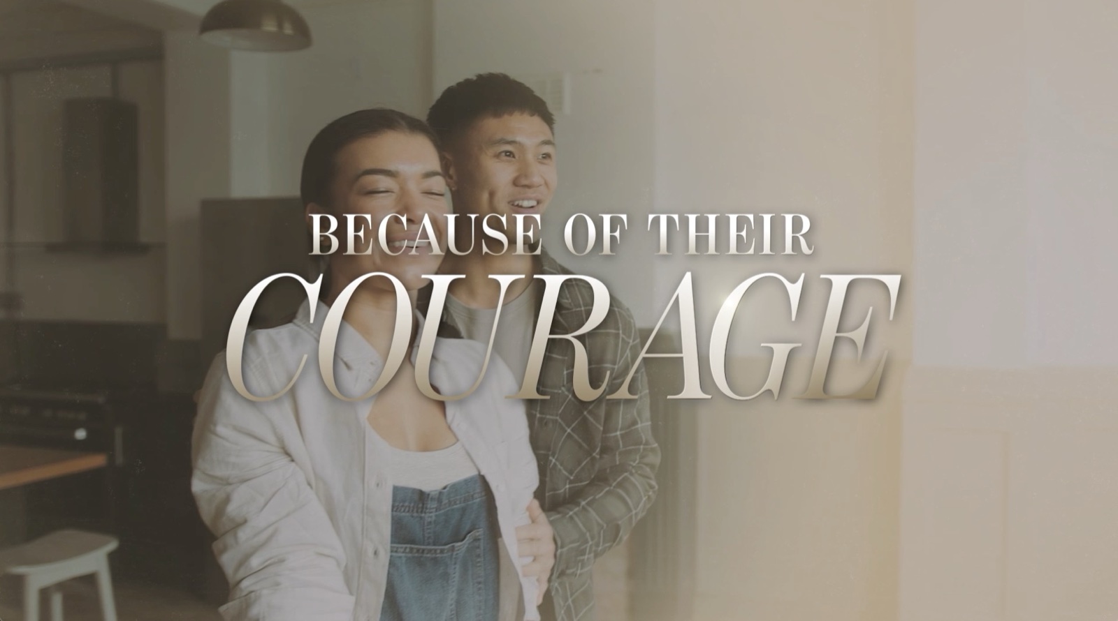 Veterans Day worship video frame showing a couple at home with overlay text Because of their courage