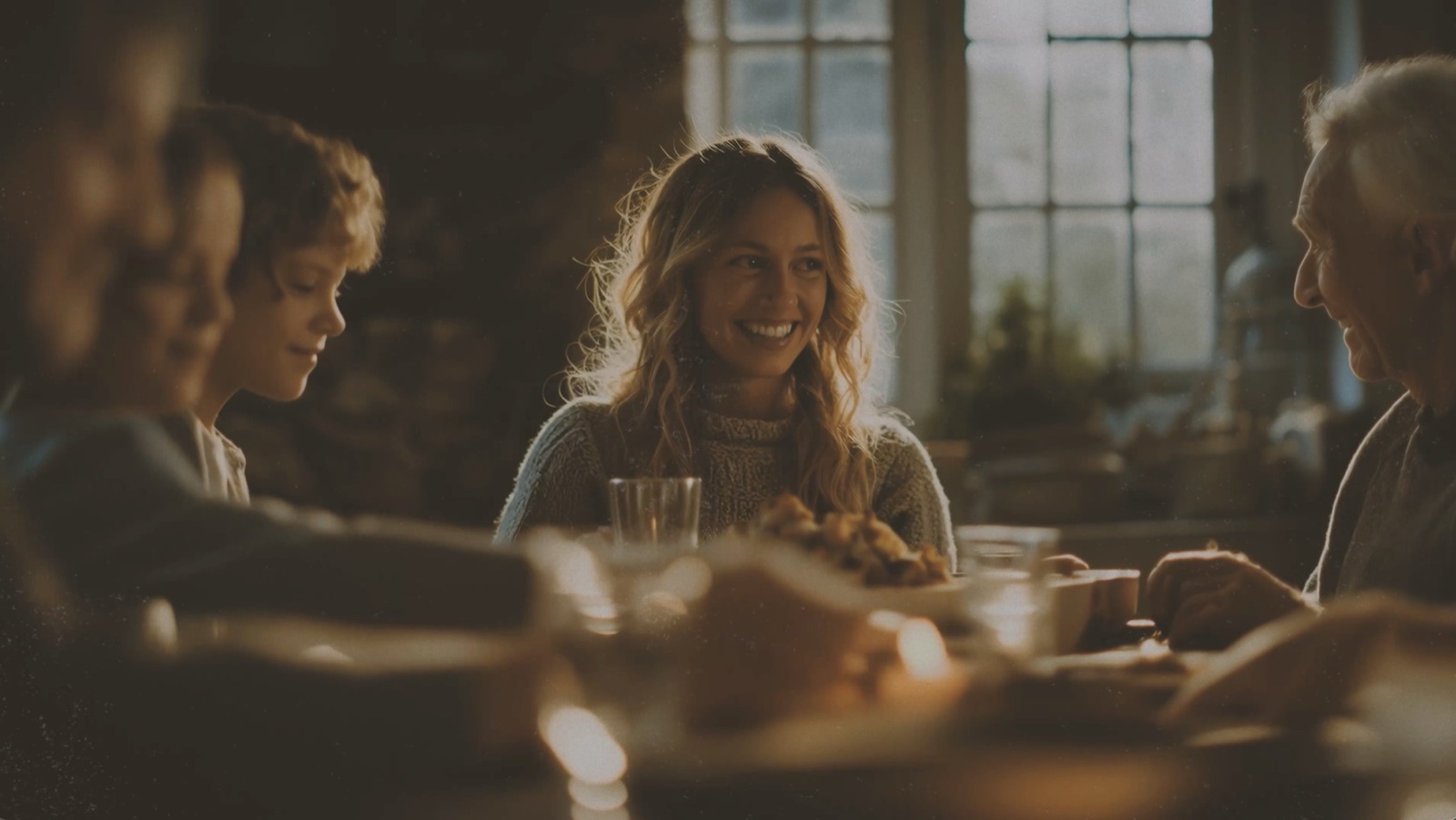 Veterans Day worship video frame of a multigenerational family gathered at a dinner table