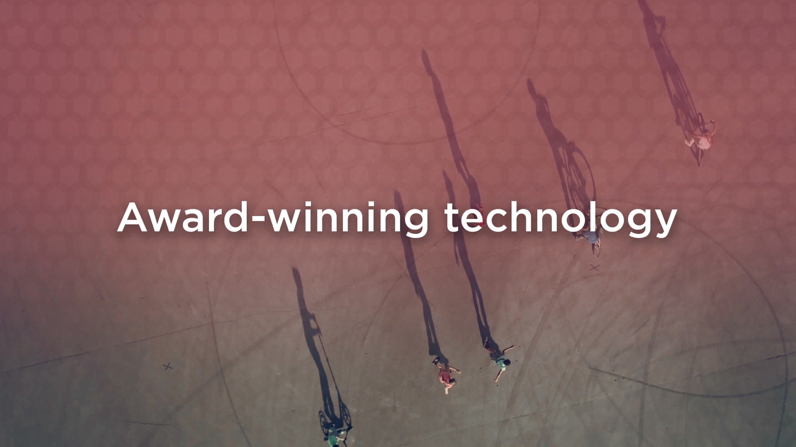 Aerial view of families biking with the headline Award-winning technology