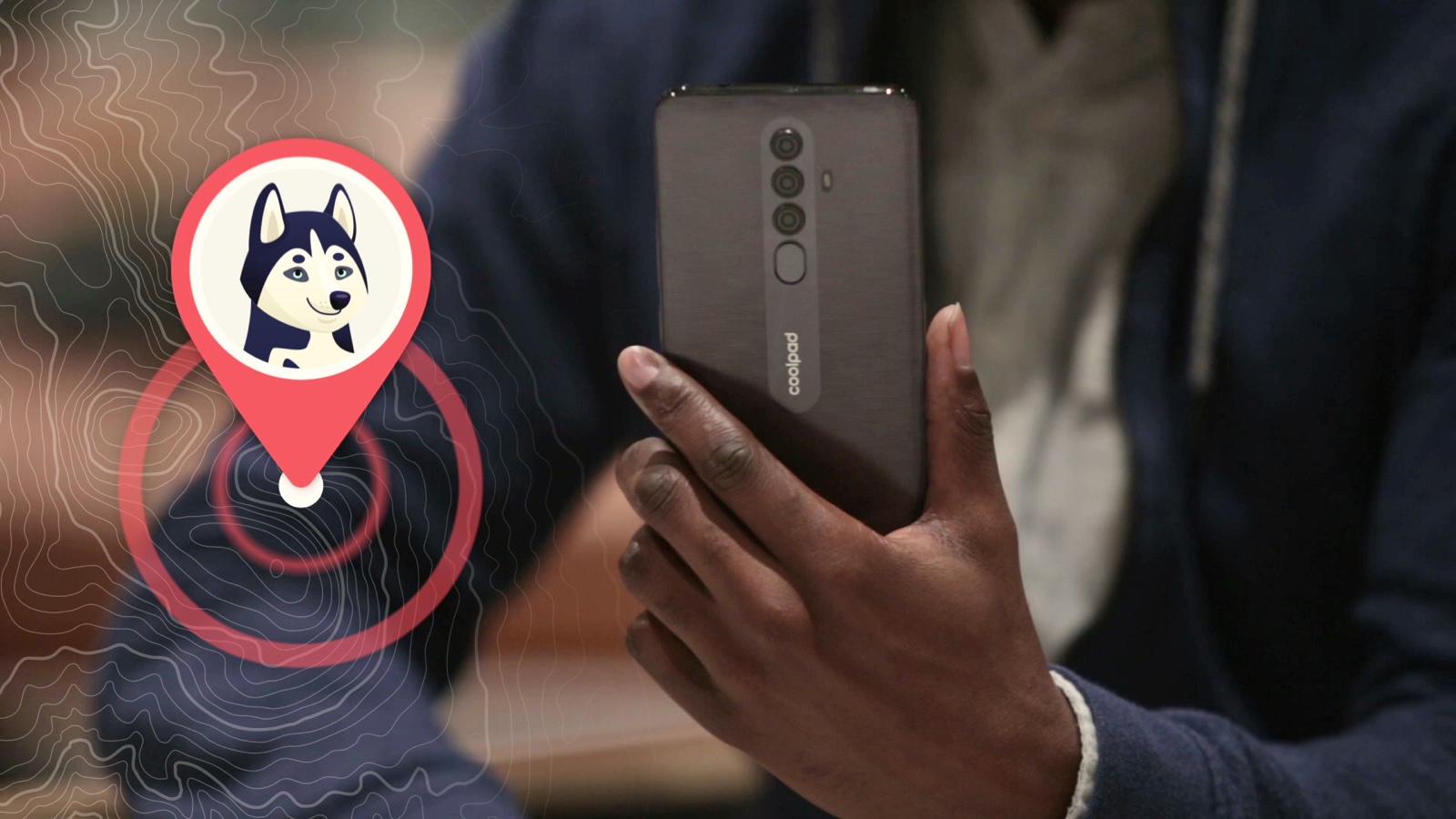 Man holding a Coolpad smartphone with an animated husky location pin for family tracking